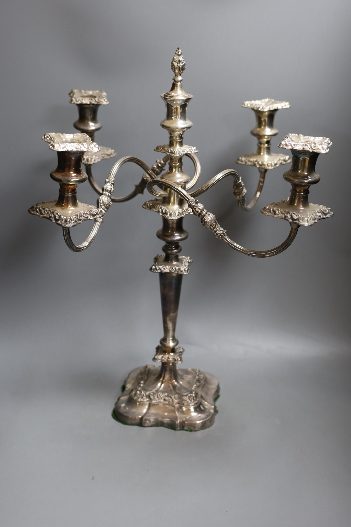 A decorative four branch plated candelabrum - 53cm tall